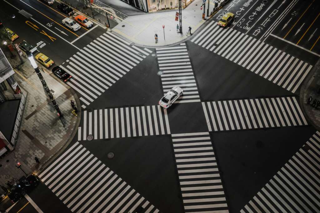 An overhead image of a traffic intersection. 
