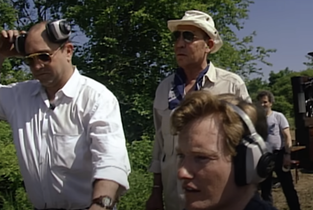 Hunter S. Thompson wearing a nice safari hat while shooting an episode of Conan O'Brien