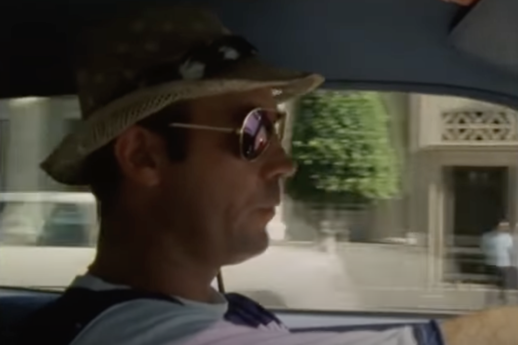 An image of Hunter S. Thompson driving around. 