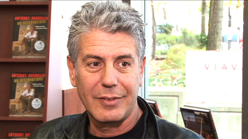 An image of Anthony Bourdain being interviewed. 
