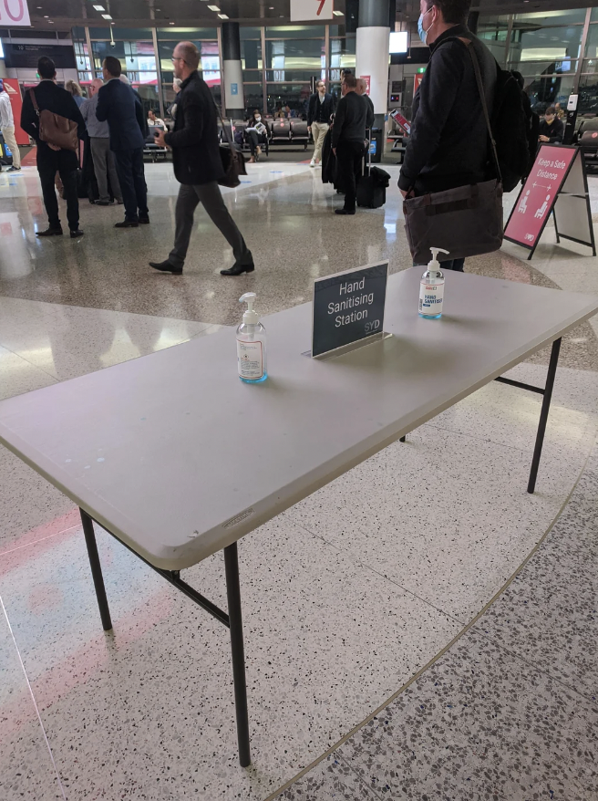 An image of empty hand sanitizer bottles at a Sydney airport. 