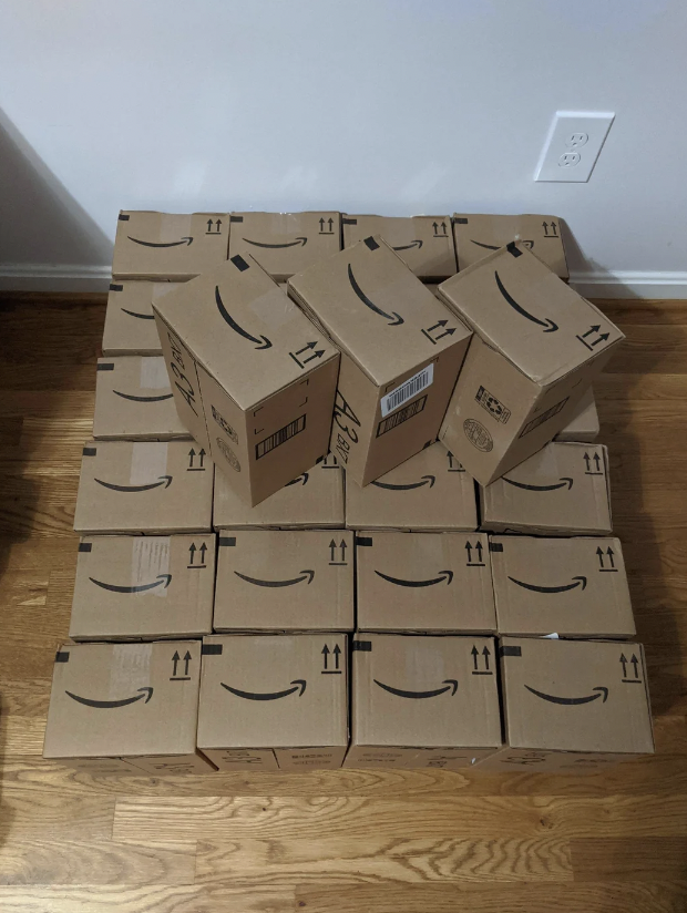 A collection of boxes used for books that were ordered from Amazon. 