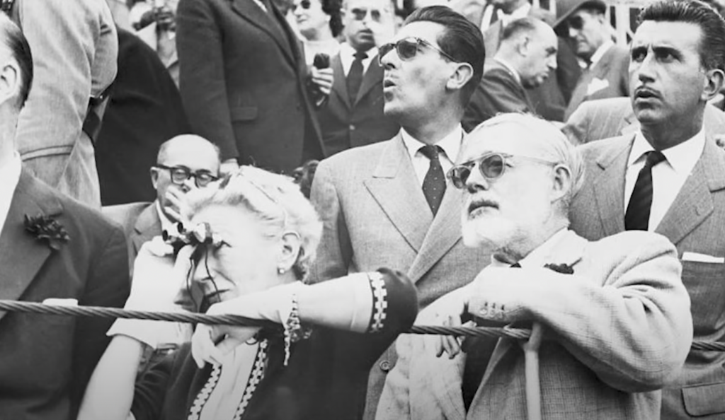 Ernest Hemingway attends a sporting event. 