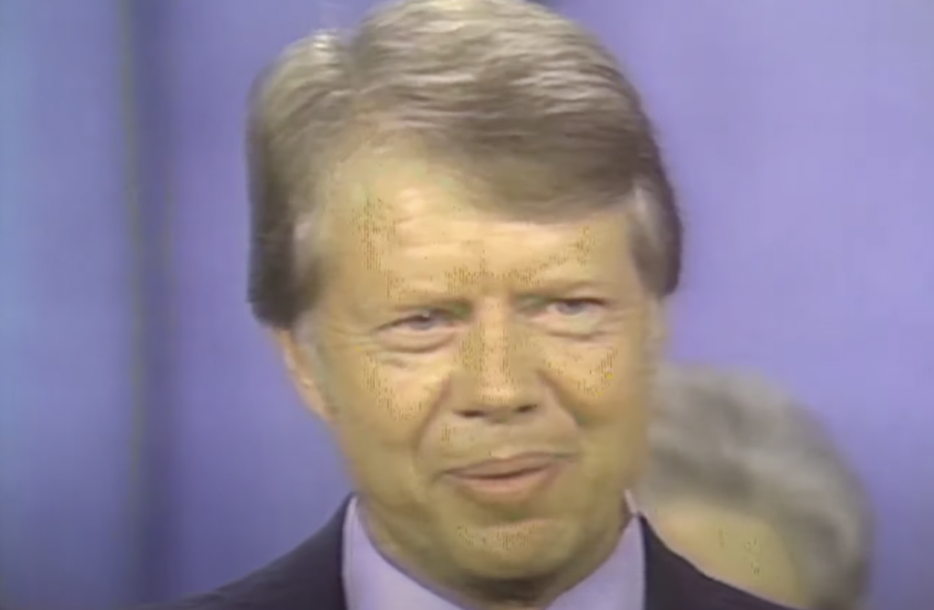An image of Jimmy Carter talking. 