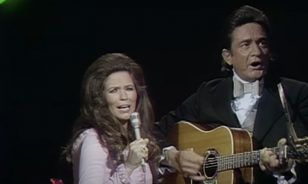 Johnny Cash singing during a duet. 