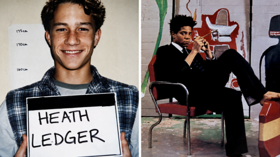 A young man holding a sign with “Heath Ledger” stands by a height chart; beside him, a person sits barefoot in a chair with colorful murals on the wall behind. Basquiat.