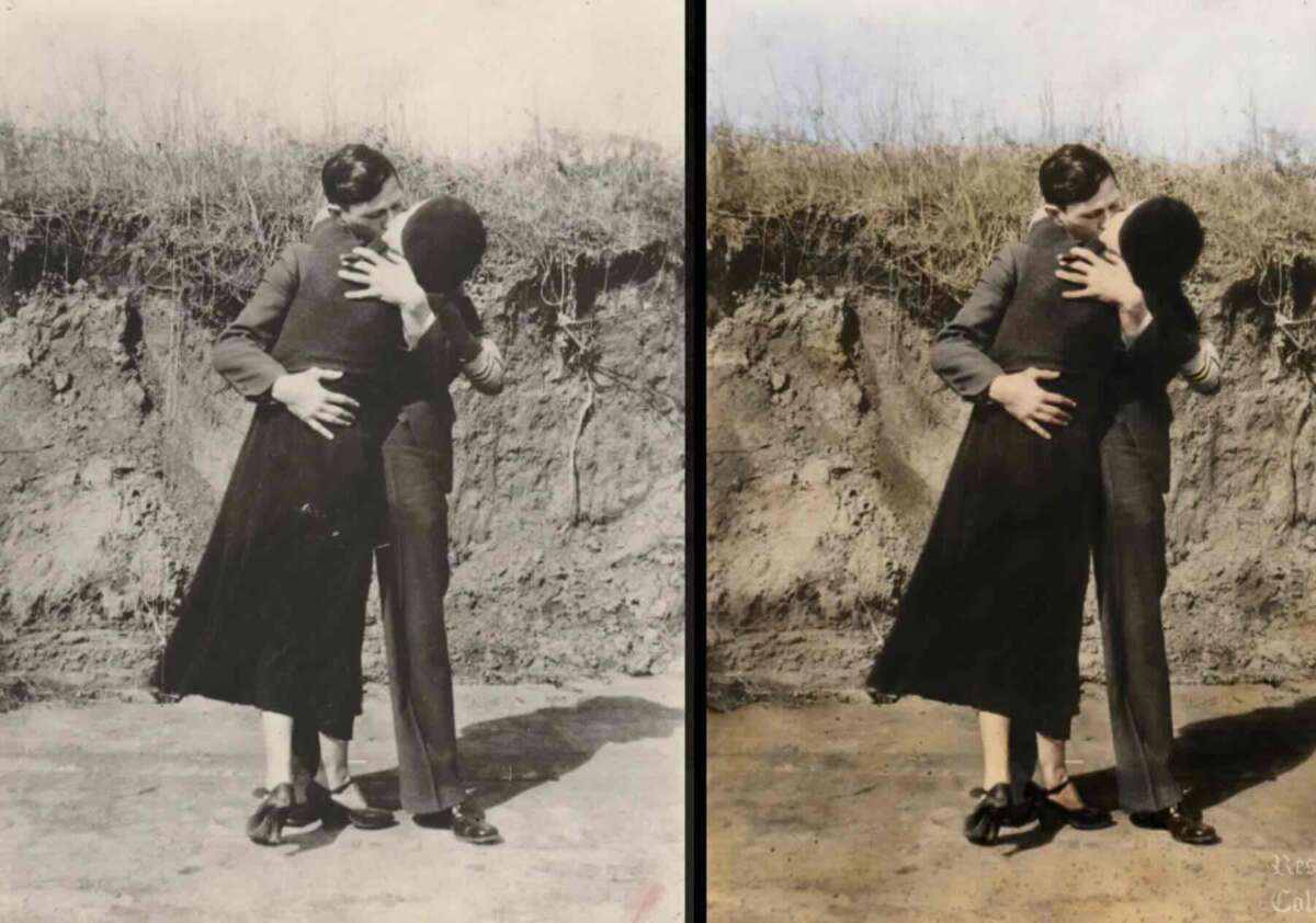 Two people embrace and kiss outdoors in front of a dirt embankment. The image appears twice side by side, with the right version enhanced in color while the left is in black and white.