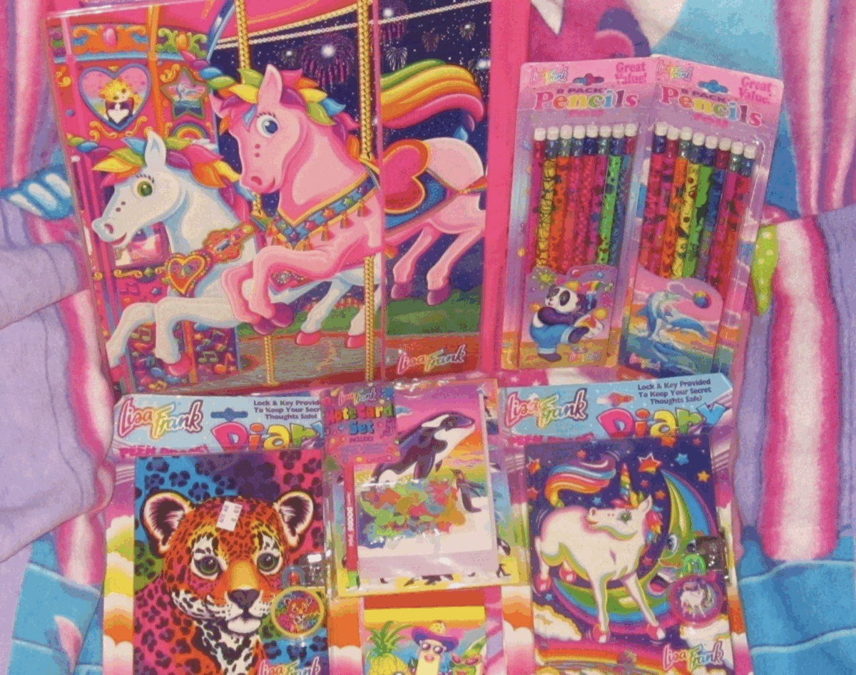 Colorful Lisa Frank stationery set with notebooks, pencils, notepads, and stickers featuring vibrant designs of unicorns, a leopard, rainbow patterns, and dolphins on a pastel striped background.