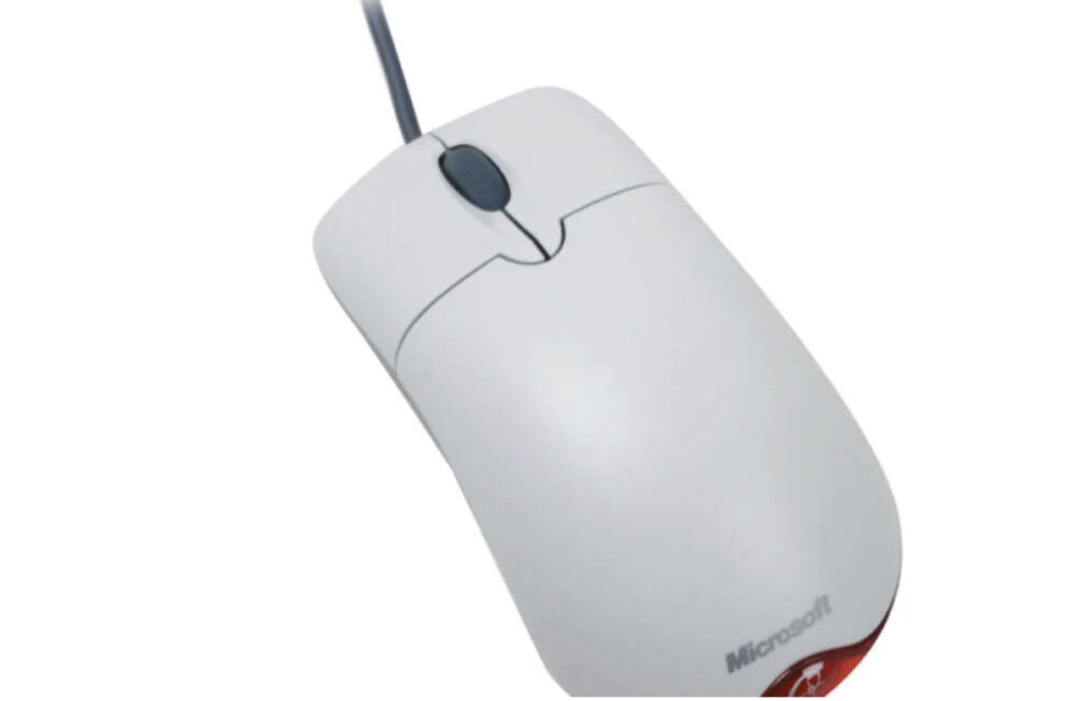 A white wired computer mouse with a scroll wheel and the Microsoft logo visible on the bottom right, set against a plain white background.