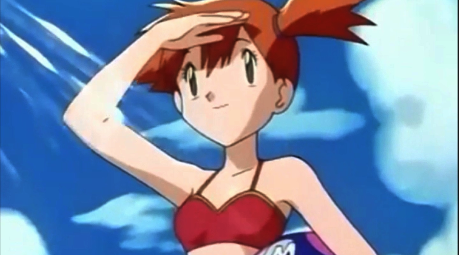 An animated girl with orange hair in pigtails, wearing a red swimsuit top, shades her eyes with her hand while looking into the distance against a blue sky with clouds.