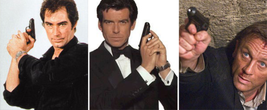Three men, each holding a gun in a classic spy pose. The first wears a black shirt, the second a tuxedo, and the third appears in rough, action-focused attire with a slight injury on his forehead.