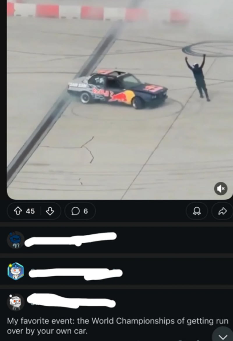 A person stands with arms raised in front of a spinning car performing a drift on a concrete surface, leaving tire marks. A humorous caption below jokes about getting run over by your own car.