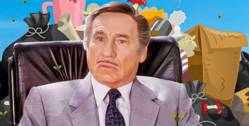 A man in a gray suit sits in a black leather chair with a puzzled expression. The background is a colorful cartoon depiction of a large pile of garbage and discarded items.