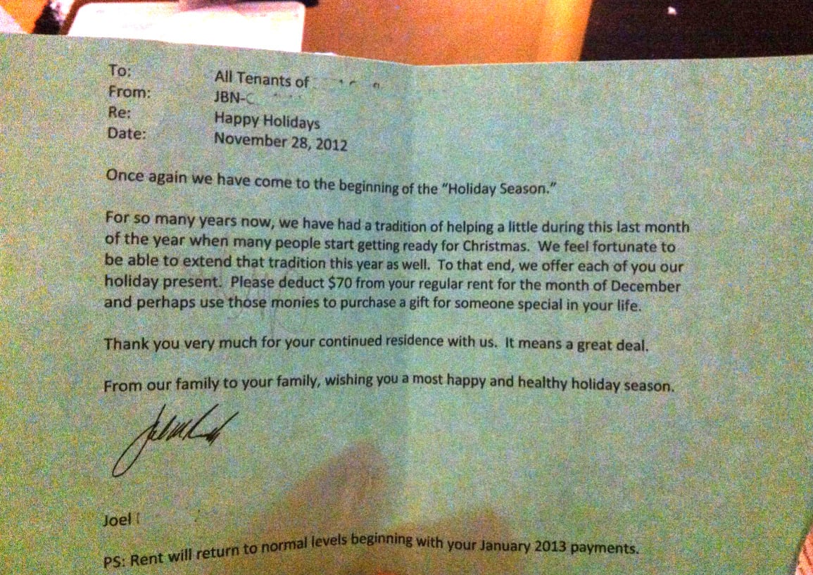 A letter to tenants from JBN-T, dated November 28, 2012, announces a $70 rent reduction for December as a holiday gift, with wishes for a happy holiday season and a note about rent returning to normal in January.