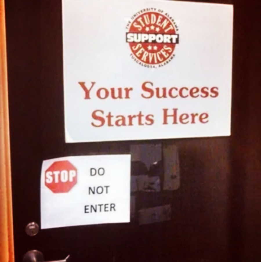 A door displays two signs: one above reads "Your Success Starts Here" from Student Support Services, and one below reads "STOP DO NOT ENTER.
