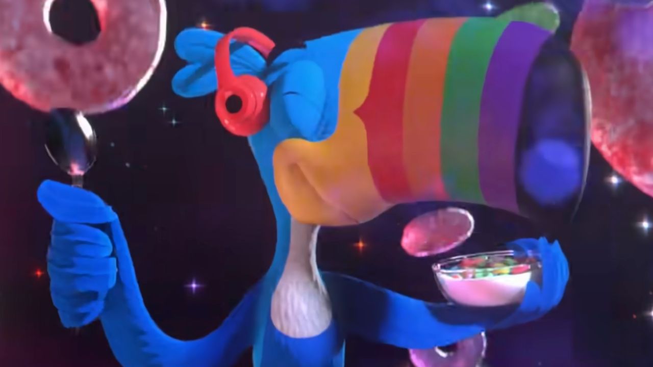 A colorful cartoon toucan with rainbow stripes wears red headphones, holds a spoon and bowl of cereal, and balances pink donuts in a starry, cosmic background.