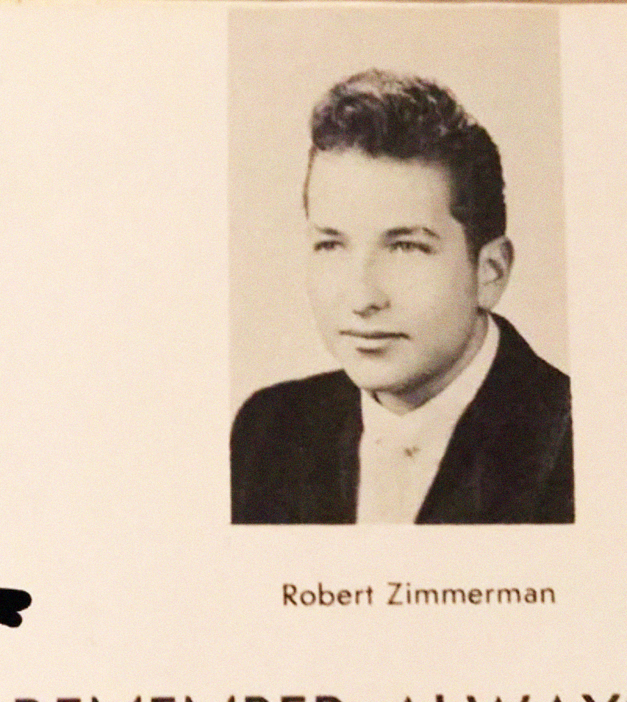 Black-and-white yearbook photo of a young man in a suit and tie with neatly styled hair. The text below the photo reads "Robert Zimmerman.