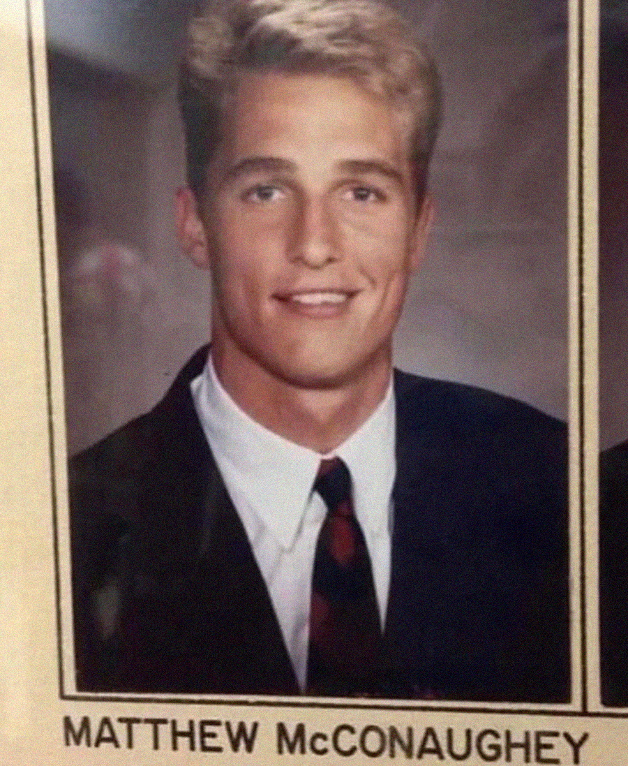 A young man with short blond hair, wearing a dark suit, white shirt, and striped tie, smiles in a formal portrait. The name "MATTHEW McCONAUGHEY" is printed below the photo.