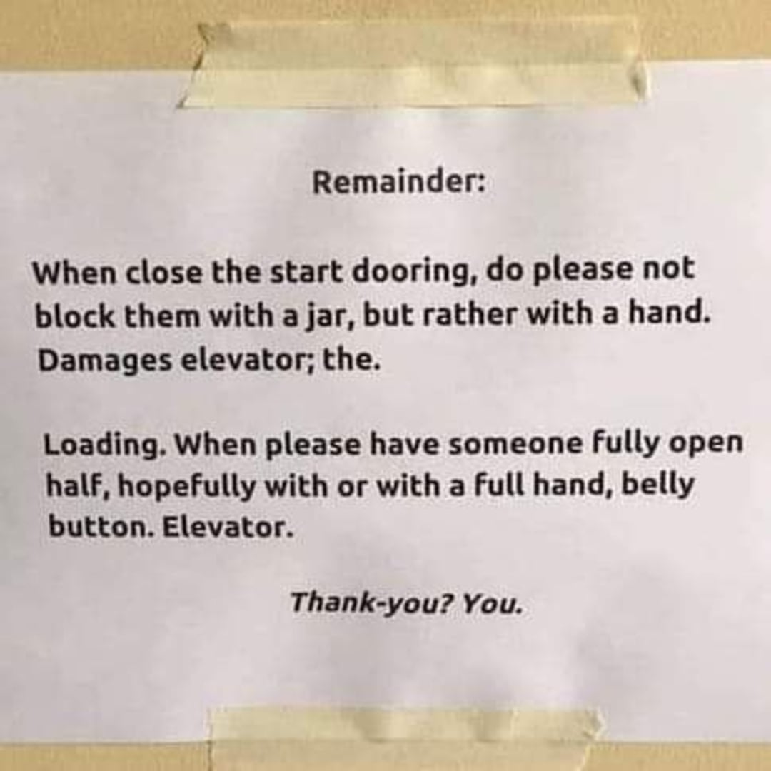 A taped sign with awkward wording asks people not to block the elevator door with a jar but use their hand, and to fully open it with a full hand using the belly button. It ends with "Thank-you? You.