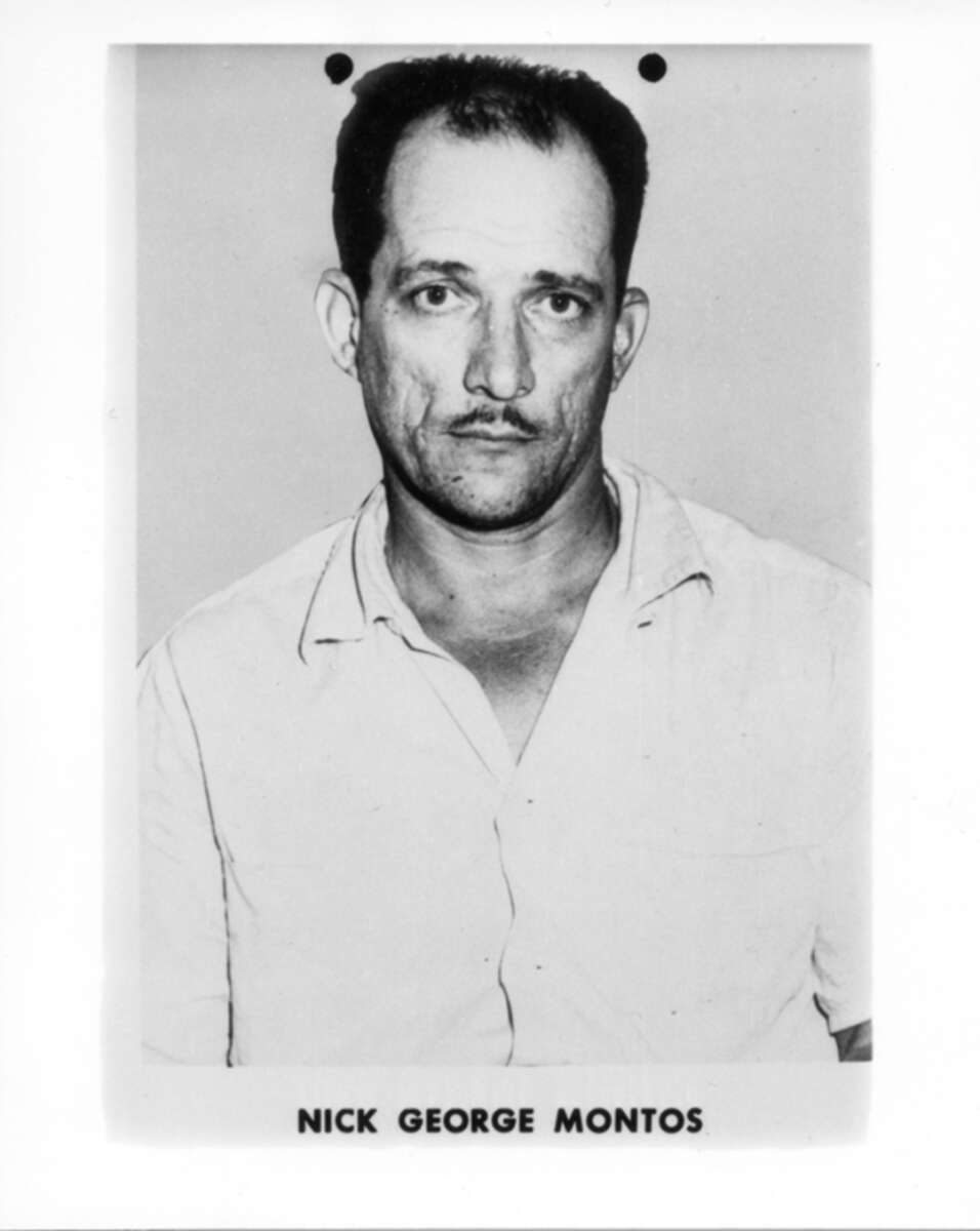 Black-and-white mugshot of a man with short hair, wearing a light-colored shirt, looking at the camera. Text below the photo reads "NICK GEORGE MONTOS.