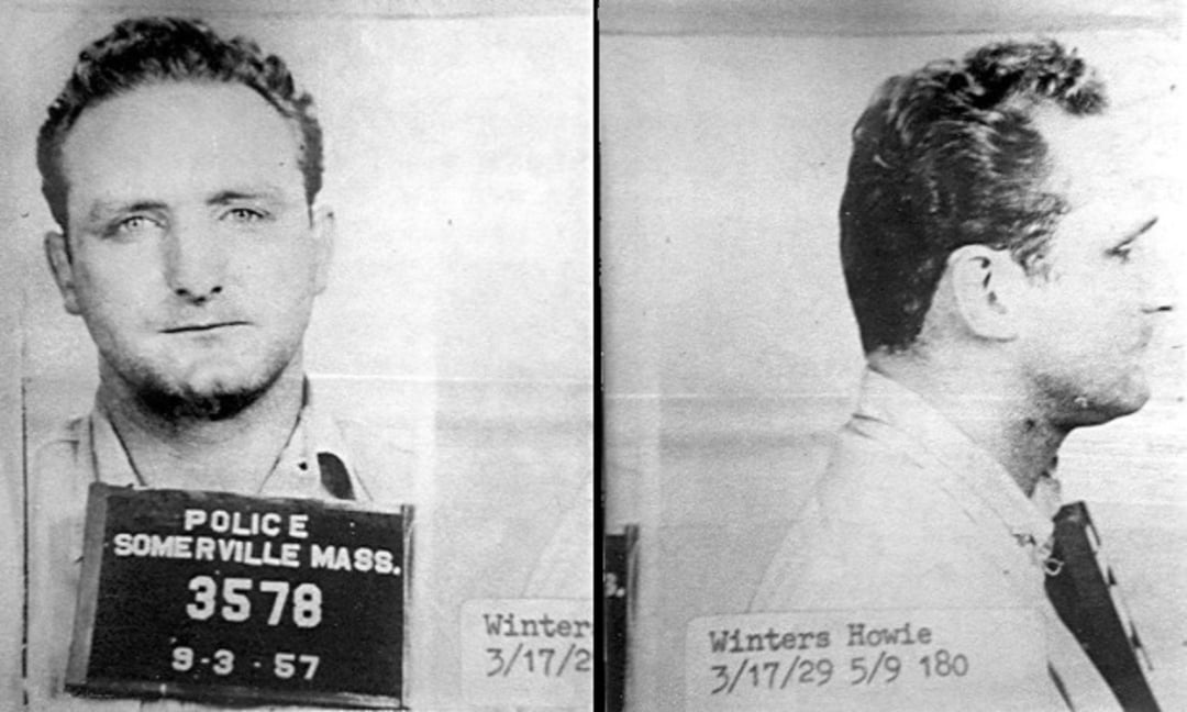 Black and white mugshot showing a man facing forward and in profile, holding a sign reading “POLICE SOMERVILLE MASS. 3578 9-3-57.” Handwritten text shows the name “Winters Howie” and personal details.