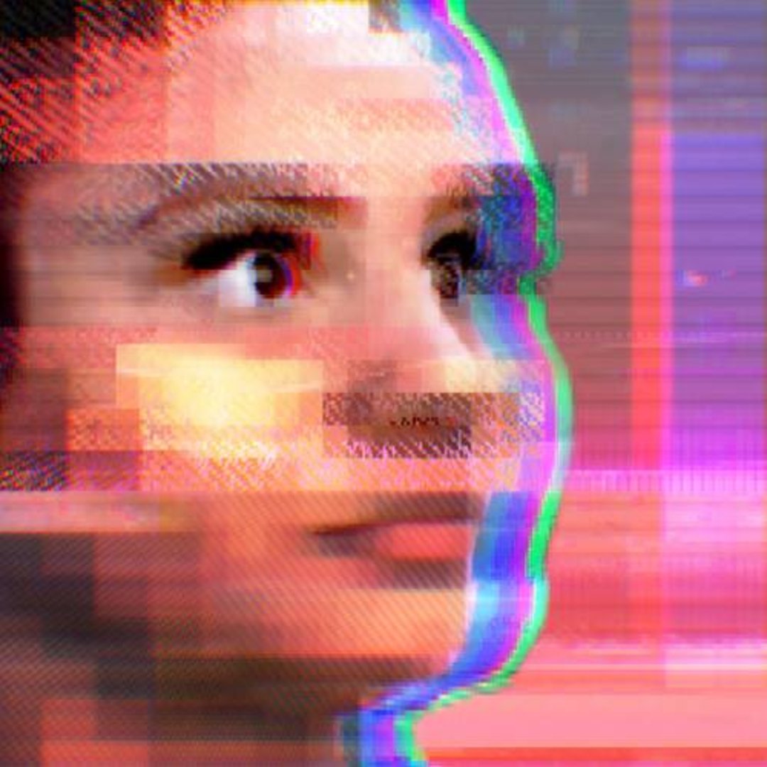 A close-up of a person's face with a serious expression, distorted by digital glitches and colorful pixelation effects, creating a futuristic and abstract look. The background is blurred with shades of pink and purple.