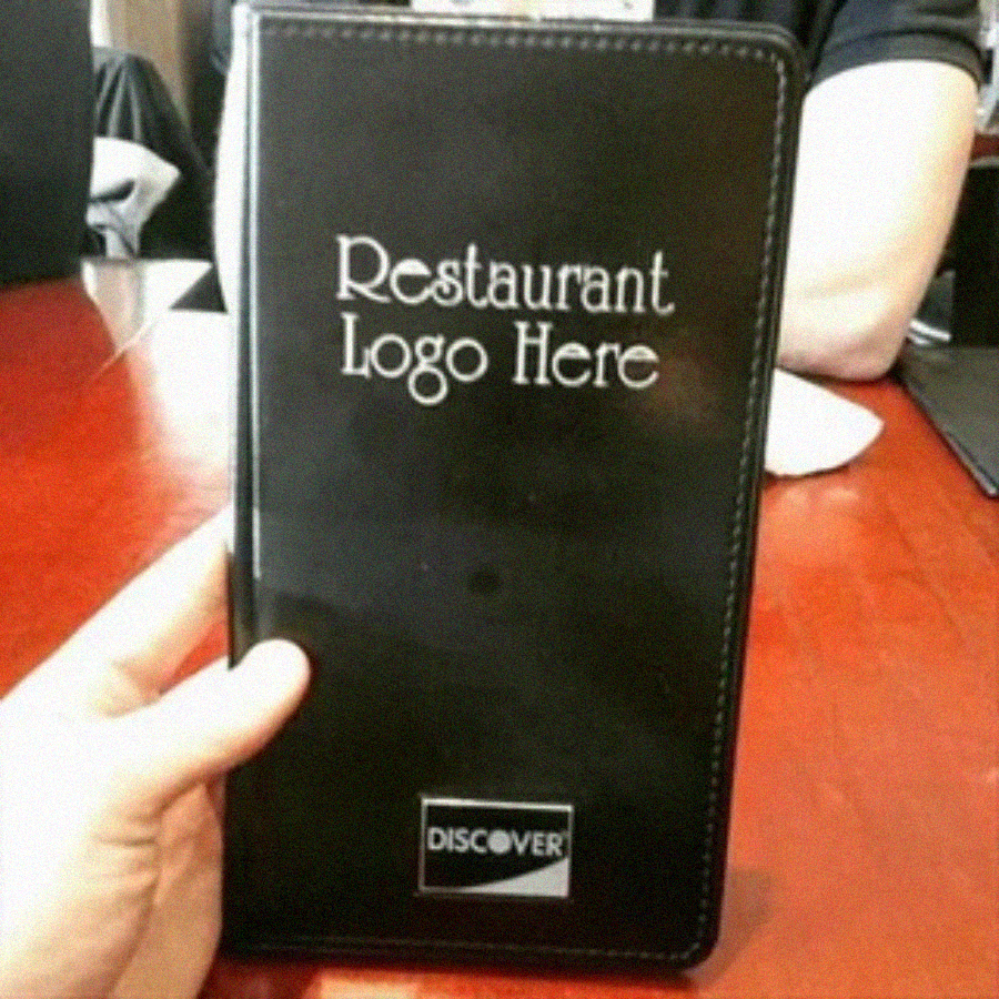A hand holds a black restaurant bill holder with the words "Restaurant Logo Here" and a Discover card logo, suggesting a placeholder instead of an actual restaurant name.