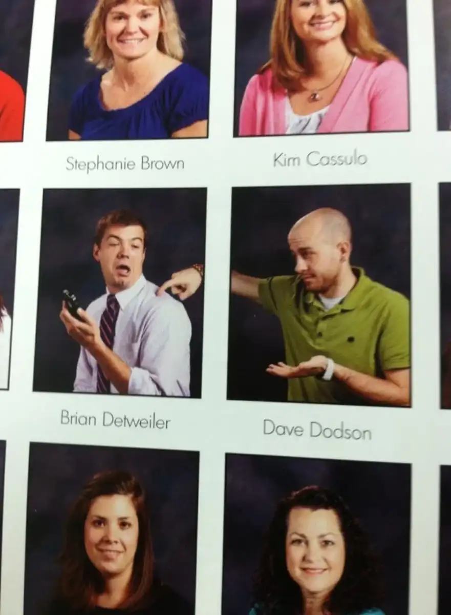 A yearbook page with headshots; in the center, two men pose humorously—one in a shirt and tie making a dramatic face with a walkie-talkie, while the other in a green polo gestures as if mocking him.
