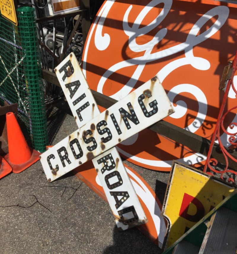 A sign on the ground