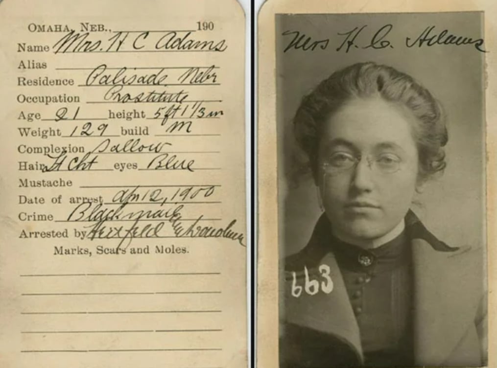 A sepia-toned mugshot and information card for Mrs. T.C. Adams, age 21, with blue eyes, light brown hair, and glasses. The card lists her stats, crime (bigamy), and a handwritten signature.