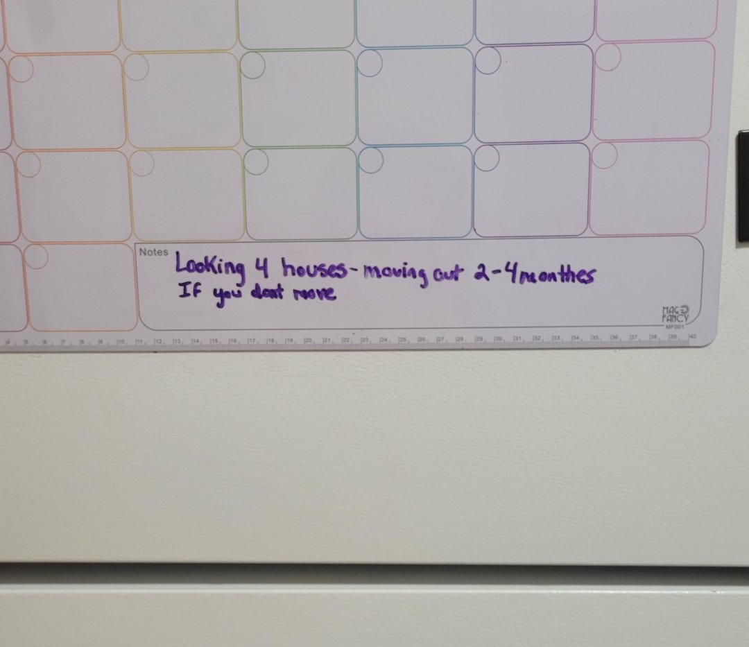 A whiteboard calendar with a handwritten note in purple ink reading, "Looking 4 houses - moving out 2-4/months If you dont move.