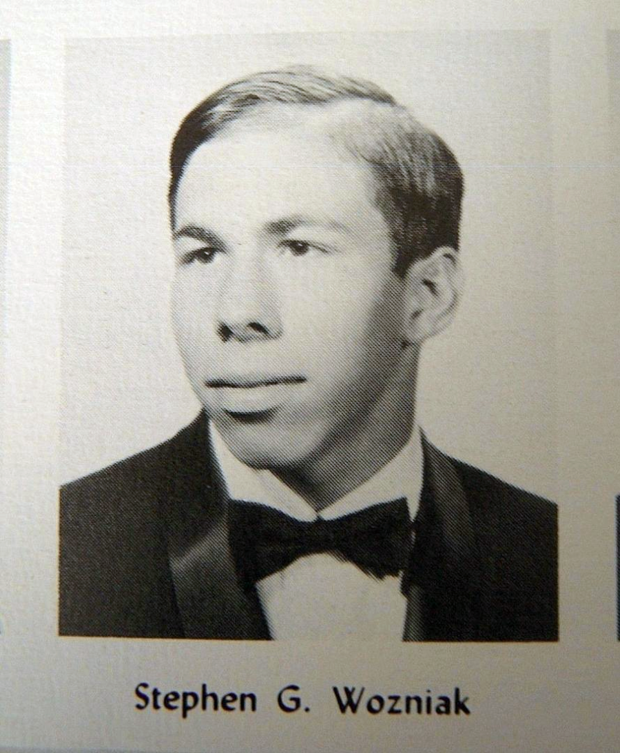 A black-and-white portrait of a young man in a tuxedo with a bow tie, looking slightly to the side. Below the photo, the name "Stephen G. Wozniak" is printed.
