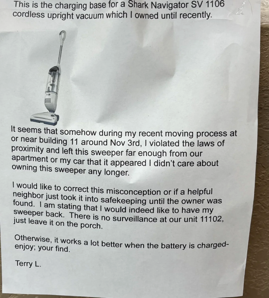 A printed note describes a missing Shark Navigator vacuum and asks for its return, clarifying the owner did not intend to discard it. An image of the vacuum is shown at the top left of the notice.