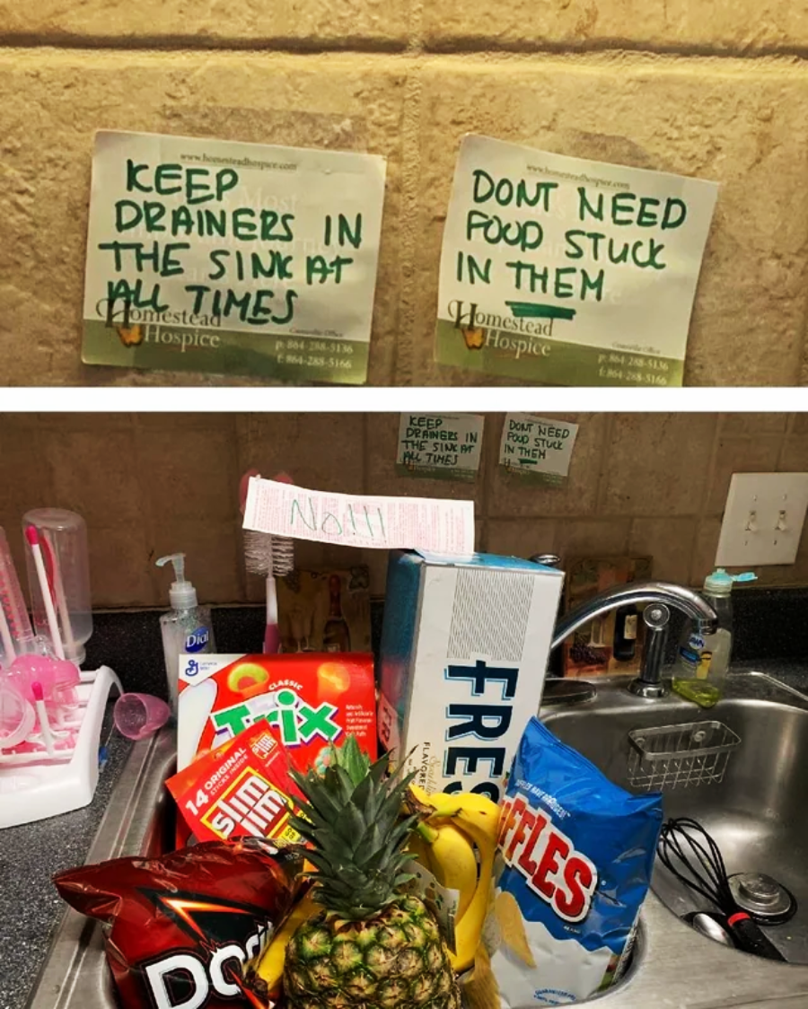 Two handwritten notes above a kitchen sink read “KEEP DRAINERS IN THE SINK AT ALL TIMES” and “DON’T NEED FOOD STUCK IN THEM.” Below, the sink is overflowing with various grocery items and snacks.