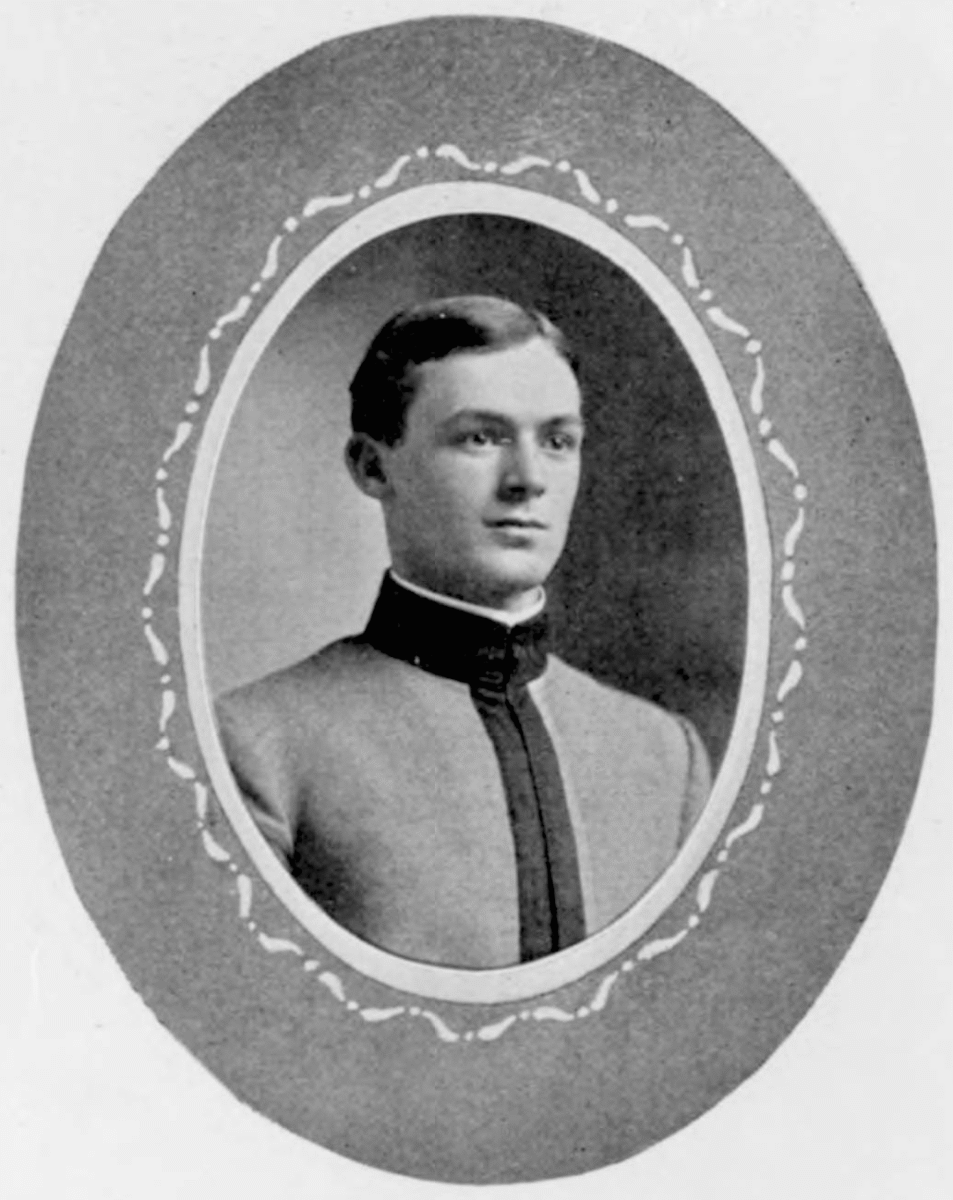 Black-and-white portrait of a young man in a formal military-style uniform, framed by an oval decorative border. He has short hair and is facing slightly to the right.