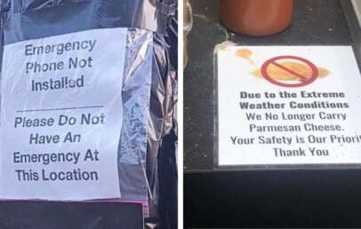 Two signs: one on a covered pole reads "Emergency Phone Not Installed. Please Do Not Have An Emergency At This Location." The second says Parmesan cheese isn't available due to extreme weather, for safety reasons.