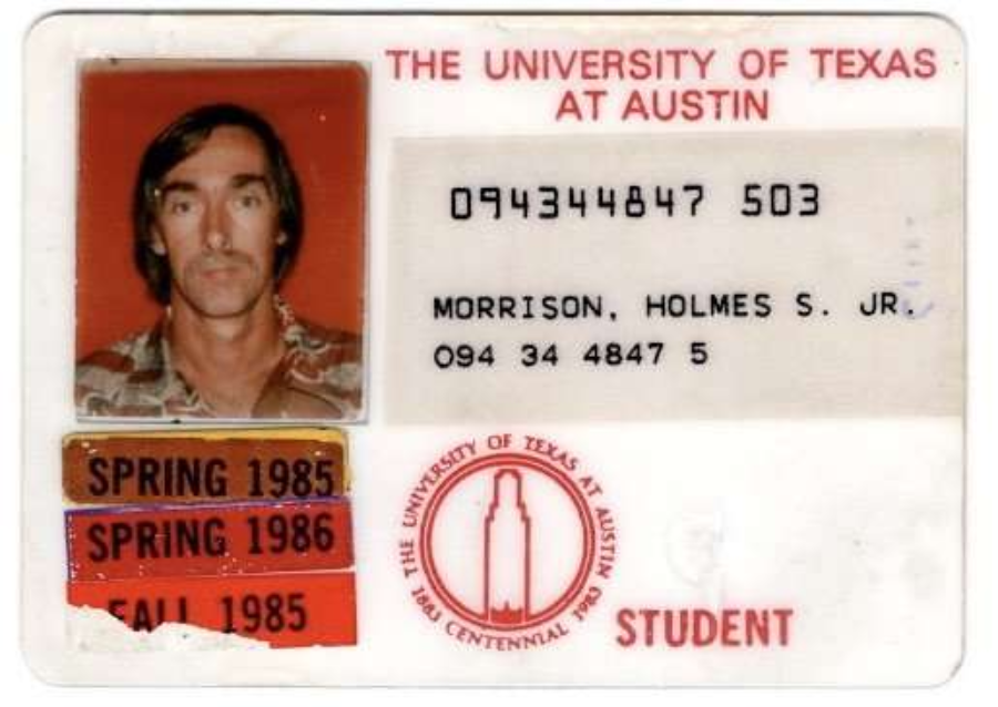 A University of Texas at Austin student ID card for Holmes S. Morrison Jr. with a photo, student number, semesters “Spring 1985,” “Spring 1986,” “Fall 1985,” and the university logo.