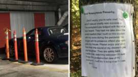 A black convertible is parked in a garage next to orange cones. Beside it, a tree has a printed letter pinned to it, addressing an anonymous passerby about a removed treehouse and enjoying an unobstructed backyard view.