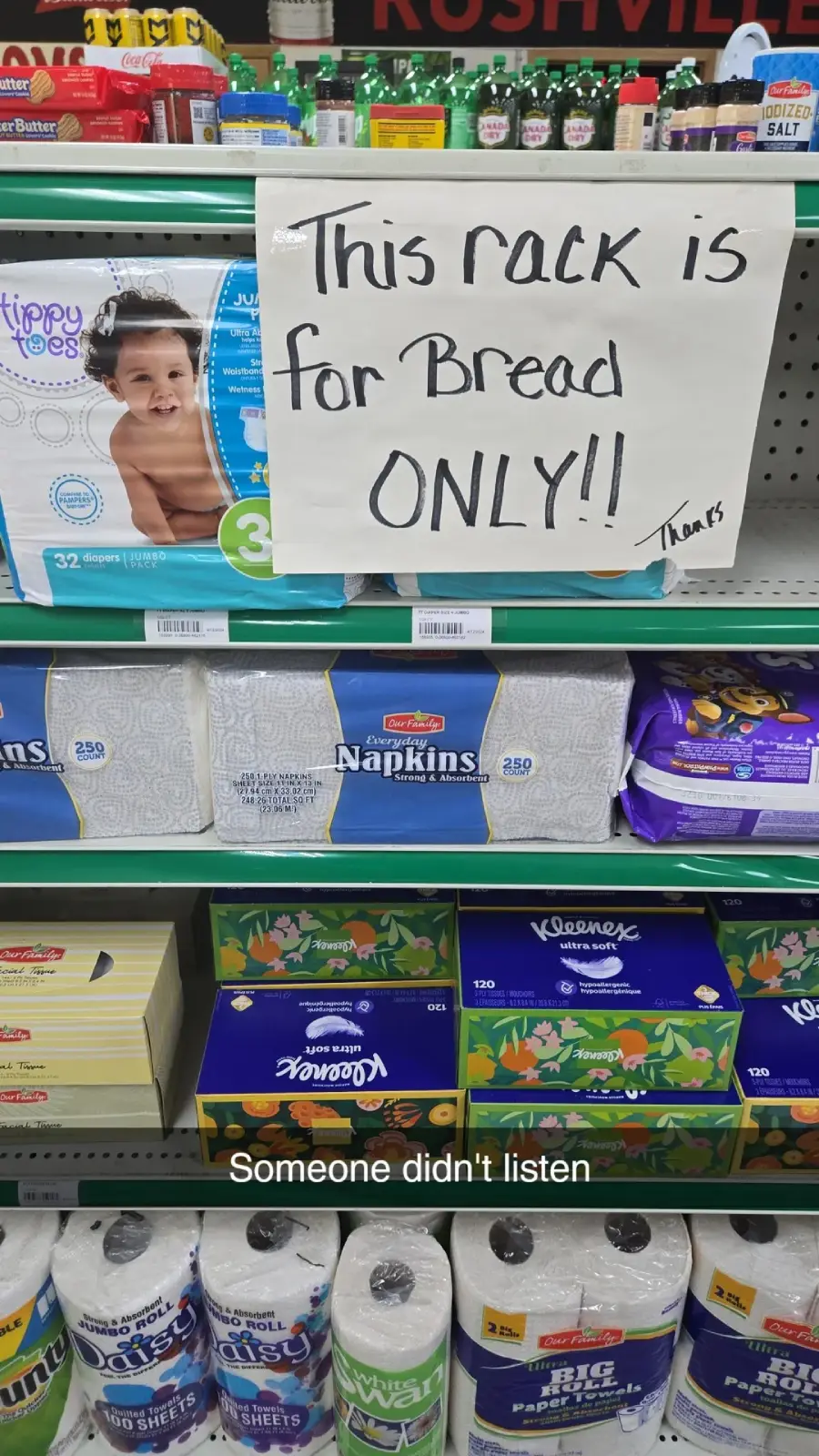 A store shelf with a sign that says "This rack is for bread ONLY!!" but the shelves are stocked with napkins, tissues, and diapers instead of bread. Text overlay at the bottom reads: "Someone didn't listen.