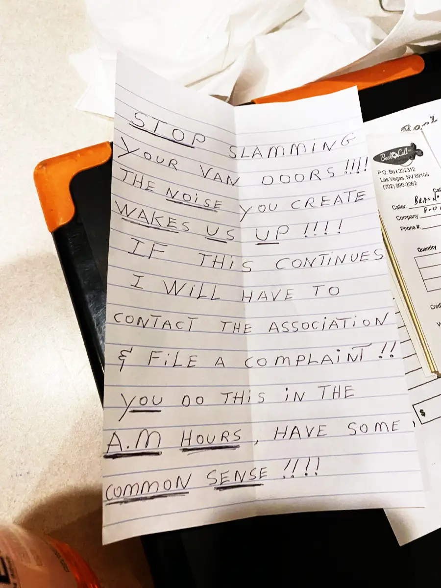 A handwritten note on lined paper reads: “STOP SLAMMING YOUR VAN DOORS!!! The noise you create wakes us up!!! If this continues I will have to contact the association & file a complaint!!! You do this in the A.M. hours, have some common sense!!!!”