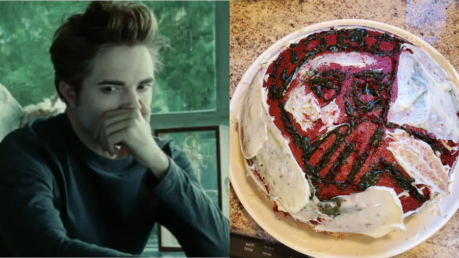 On the left, a pale person with reddish-brown hair sits with a hand over their mouth, looking serious. On the right, a homemade cake with smeared white and red icing depicts a face in a rough, abstract style.