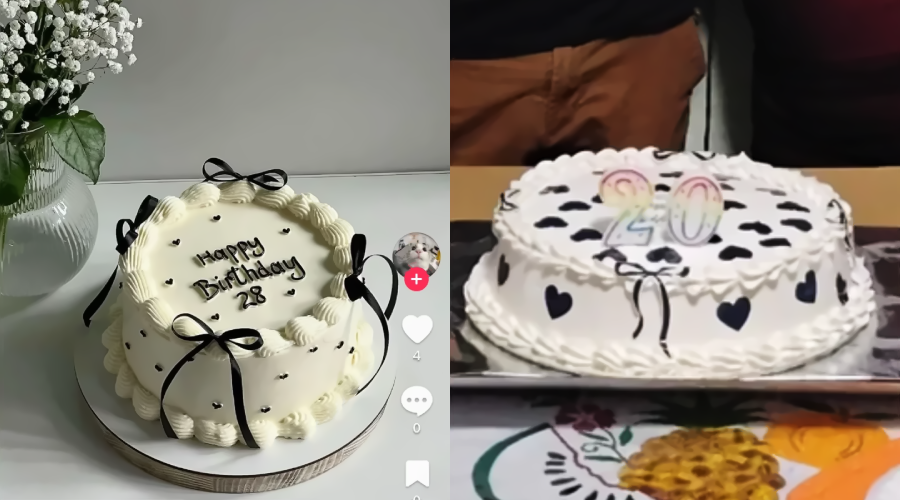 Two white birthday cakes with black decorations. The left cake says "Happy Birthday 28" with black bows and hearts, while the right cake has black spots, heart shapes, and colorful candles forming the number 20.