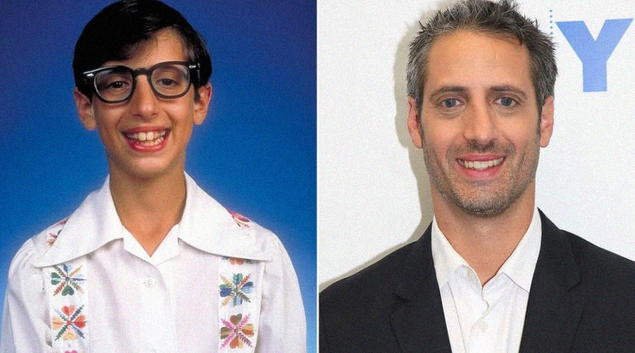 Side-by-side photos of the same man: left as a child in large glasses and a floral shirt, smiling against a blue background; right as an adult in a suit, smiling against a white backdrop.