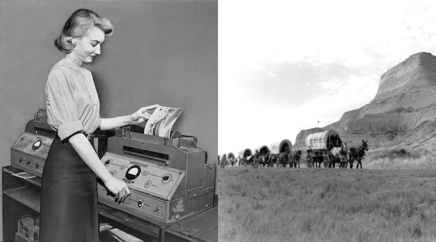 A woman operates a vintage machine on the left; on the right, a line of covered wagons travels through grassy plains with hills in the background.