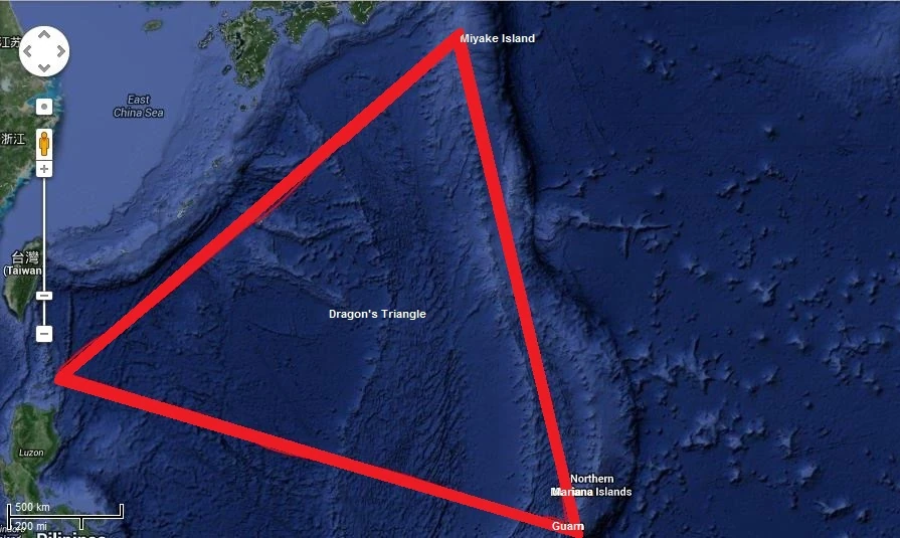 A satellite map of the northwest Pacific Ocean shows a red triangle labeled "Dragon’s Triangle,” with corners at Miyake Island, Guam, and the Northern Mariana Islands. The surrounding ocean and nearby landmasses are visible.