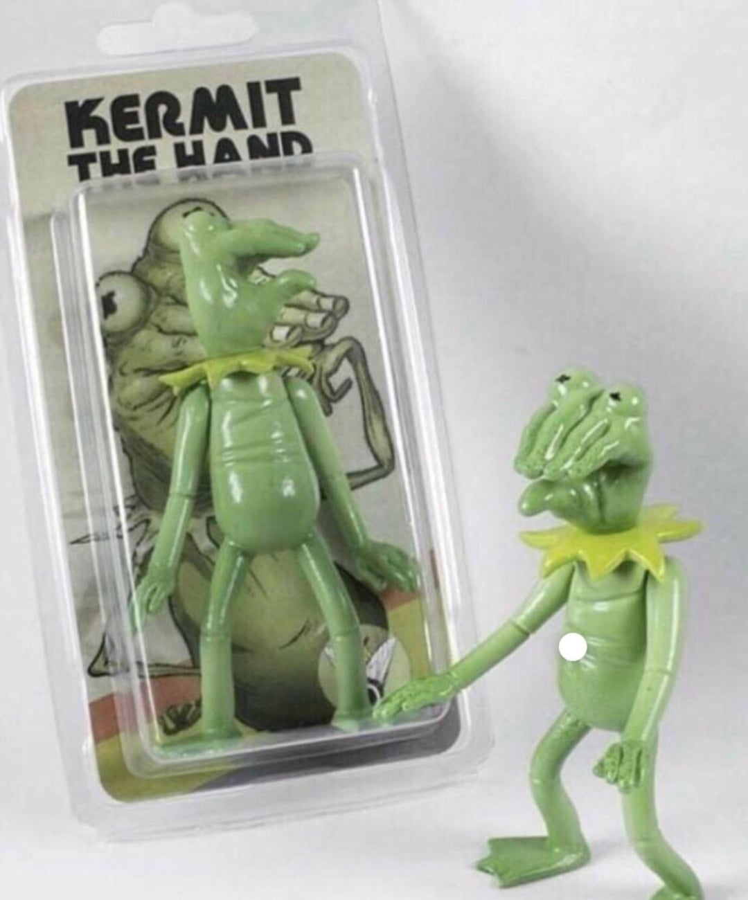 A toy labeled "Kermit The Hand" shows a distorted green frog figure with extra fingers on its face, packaged in clear plastic, with an illustration of the same figure on the backing card.