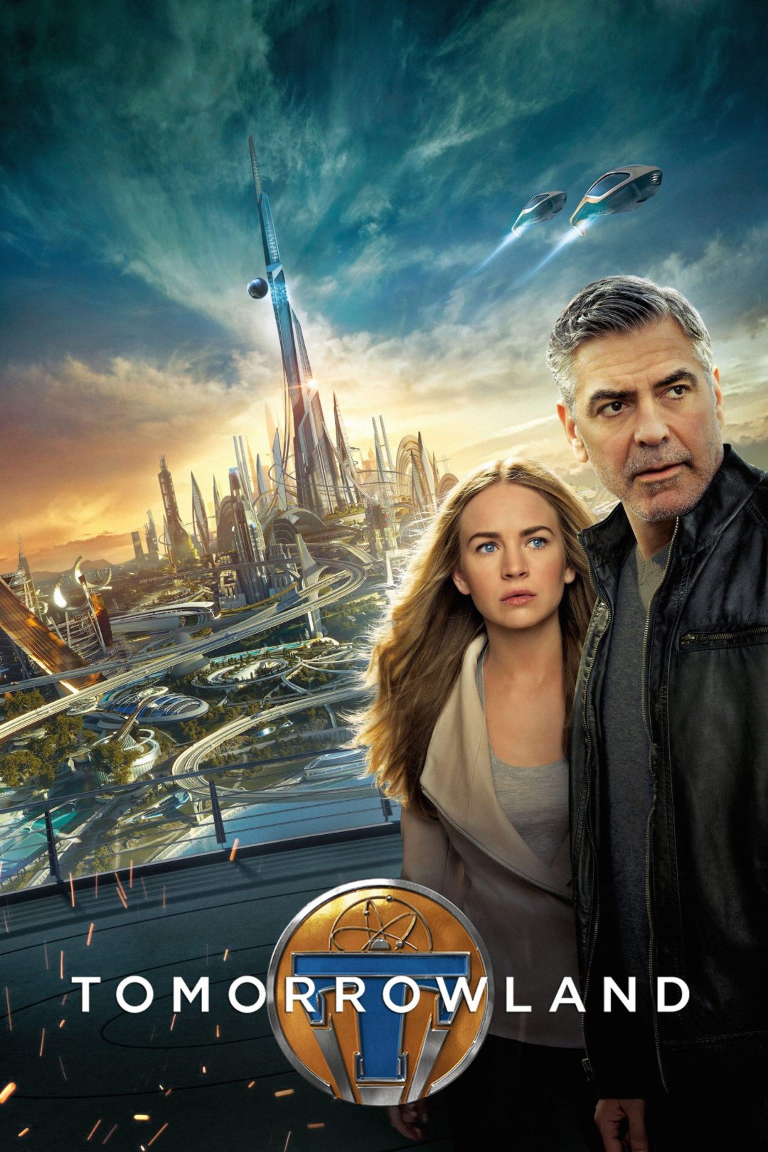 A man and a woman stand in front of a futuristic cityscape with tall, sleek buildings and flying vehicles. The word "Tomorrowland" is displayed at the bottom with a blue and gold emblem.