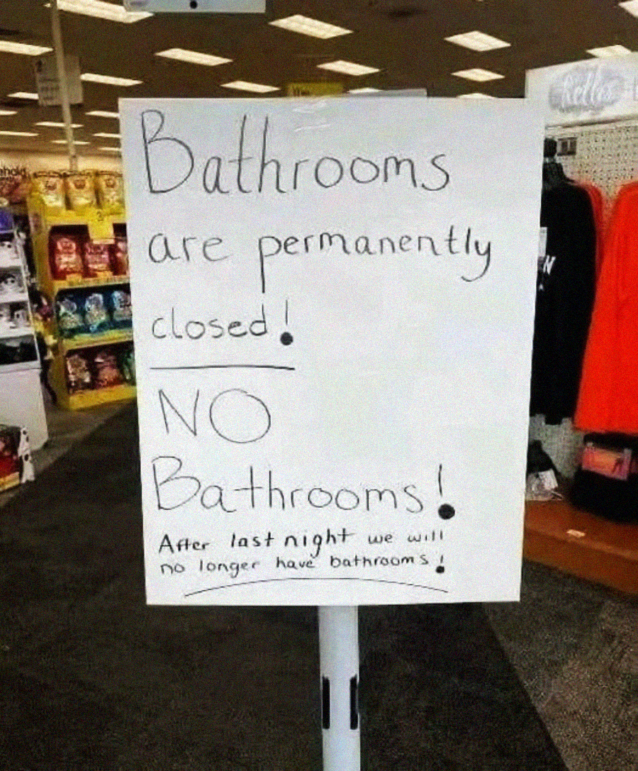 A handwritten sign in a store says, "Bathrooms are permanently closed! NO Bathrooms! After last night we will no longer have bathrooms!" Shelves and products are visible in the background.