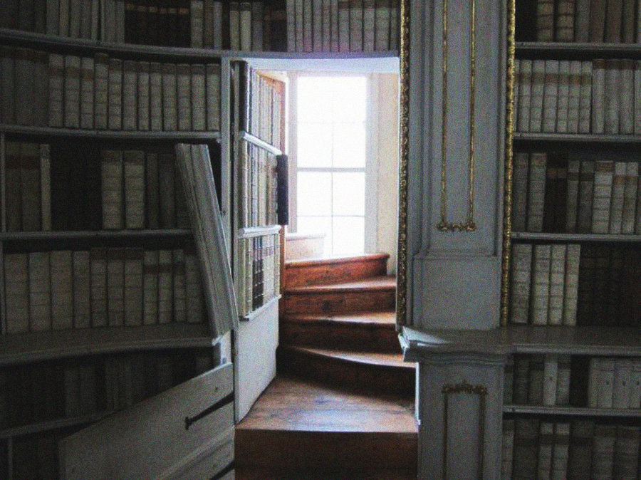 A hidden doorway disguised as a bookshelf opens to reveal a winding wooden staircase leading up to a sunlit window in an old library.