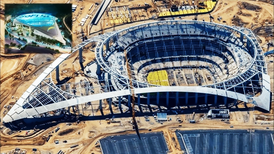 Aerial view of SoFi Stadium under construction, showing exposed steel framework and surrounding dirt. Inset at top left displays a completed artist rendering of the finished stadium with surrounding water features.